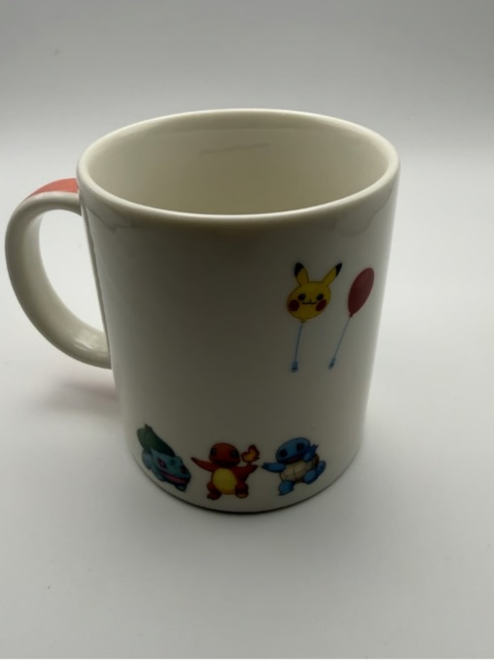 White Ceramic Character Mug with Pikachu, Bulbasaur, Charmander & Squirtle